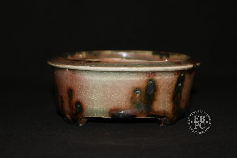 Eddie Curtis, England.   - 12.3cm; Hand-thrown; Round;  Exceptional Salmon Pink &amp; Celadon Glaze; Scorched Features; Blood-Red; Crackle Effect; Stamped with Artist&#39;s Logo.