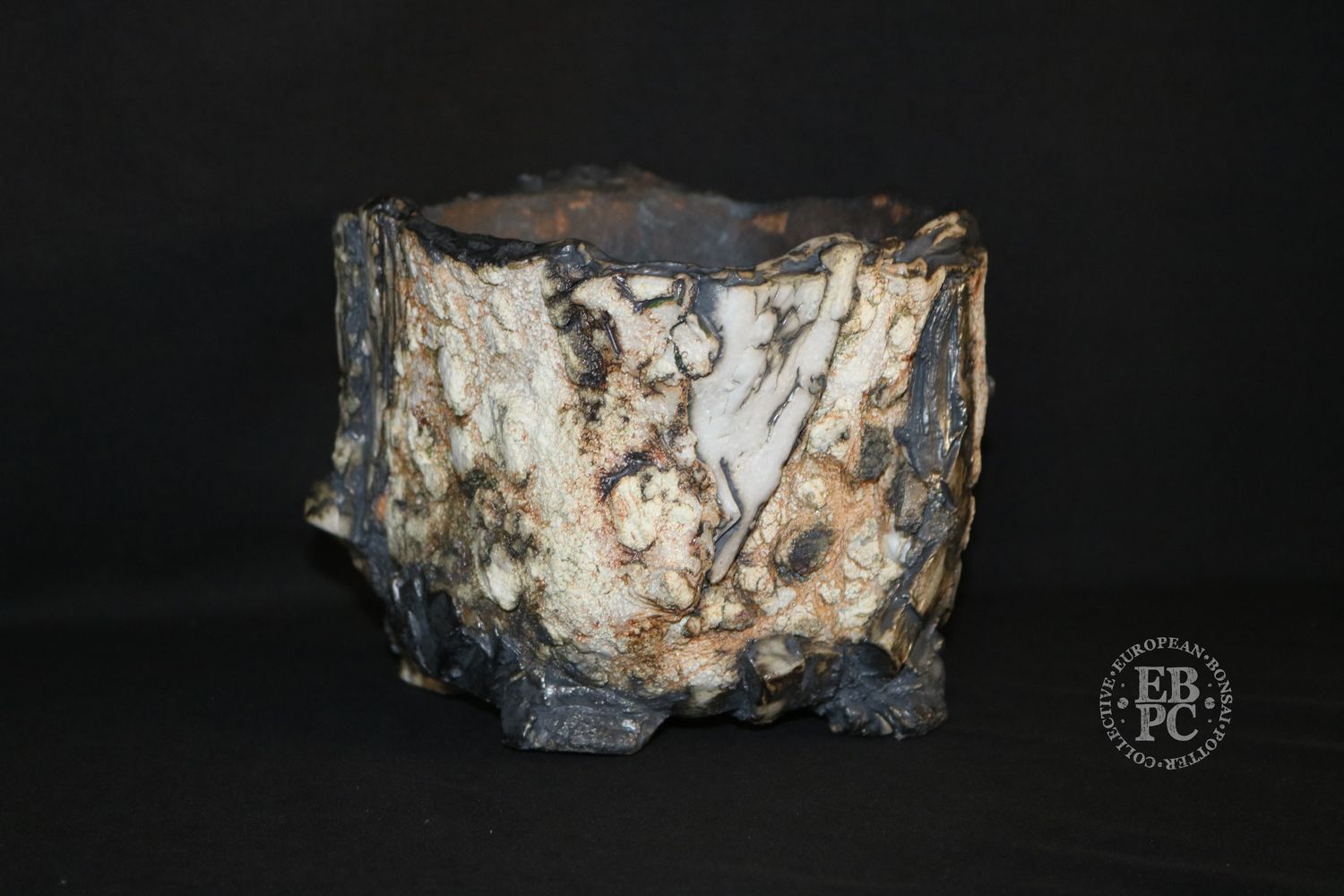 Eddie Curtis, England.   - 20cm; Unique Design Semi Cascade; Lithic Rock Effect; Multiple Glaze Techniques; Various Distinct Textures; Artist Stamped;