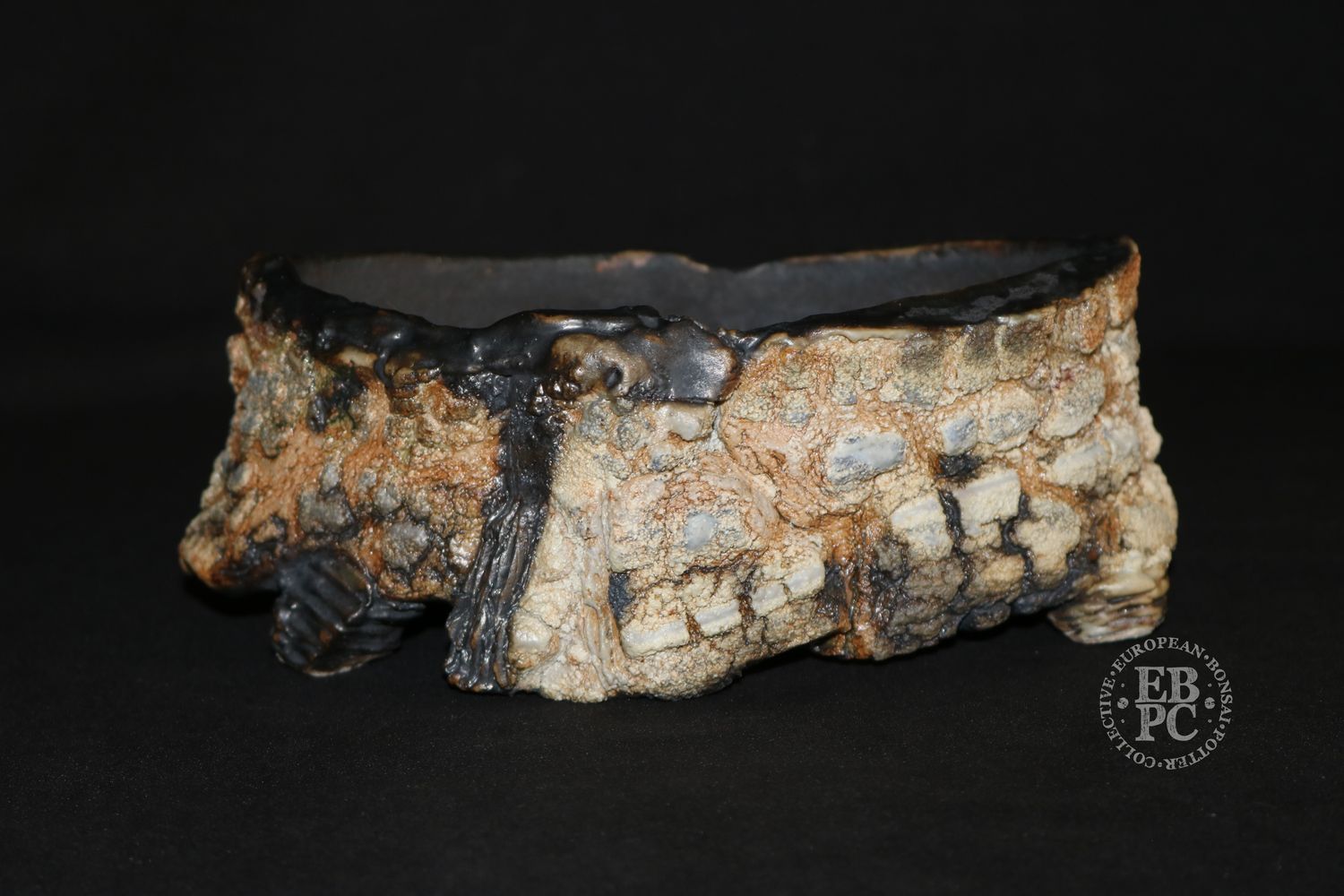 Eddie Curtis, England.   - 20cm; Unique Design Oval; Rock Effect; Shino Glaze; Multiple Glaze Techniques; Various Distinct Textures; Artist Stamped;