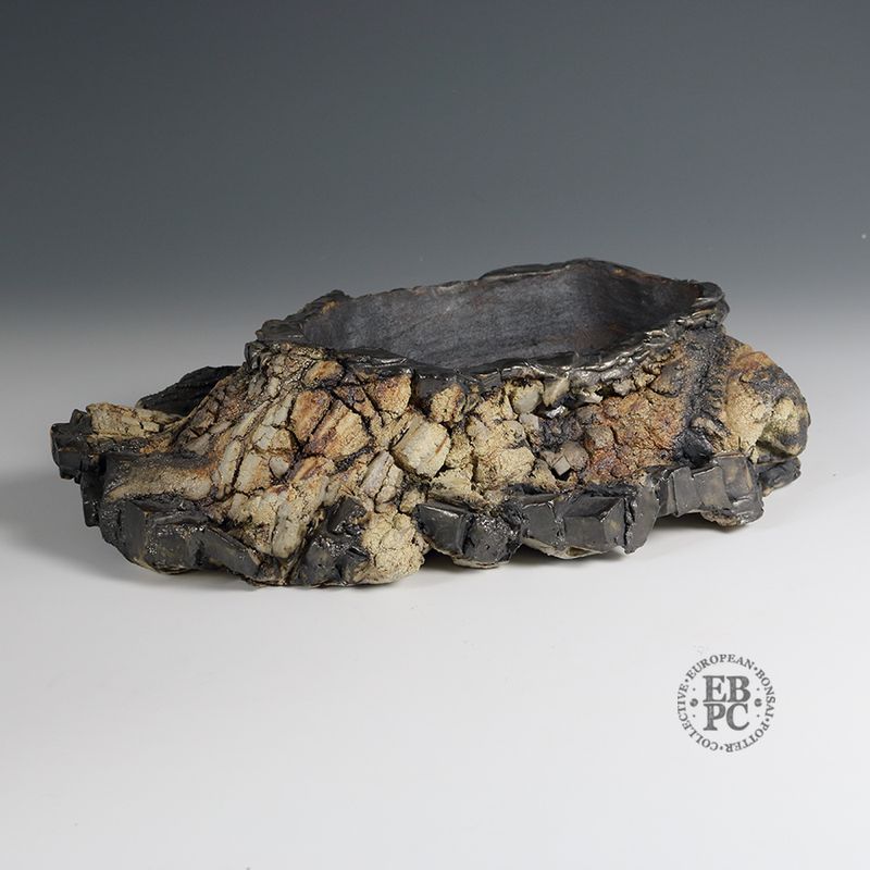 Eddie Curtis, England.   - 35cm; Unique Design Rectangle; Lithic/Rock Effect; Multiple Finish Techniques; Various Distinct Textures; Artist Stamped;