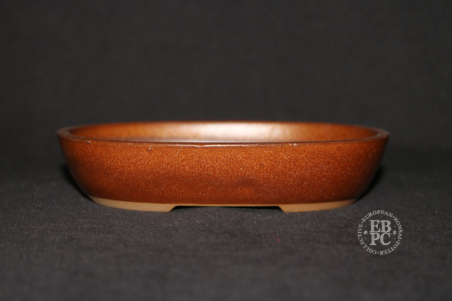 Tongrae - Korea.   cm; Oval; Glazed; Recessed Feet; Intricate Glaze; Browns  * Offered on behalf of a client.