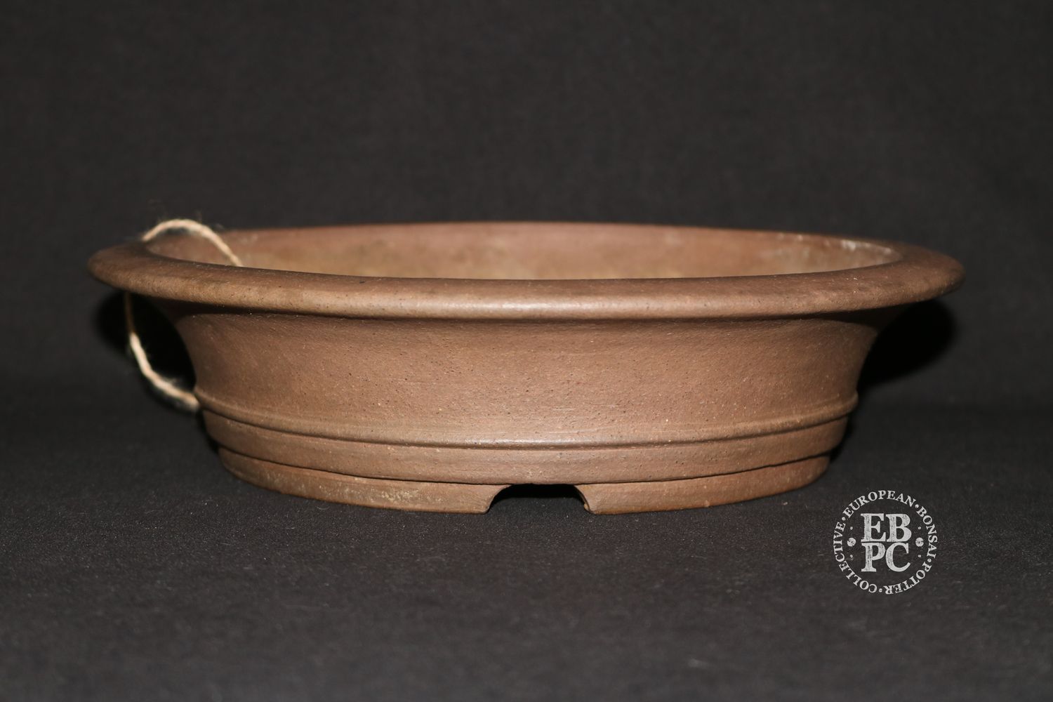 Gyouzan – Yukizyou Nakano; Japan.  25.2cm; Round; Unglazed; Stamped By Artist;