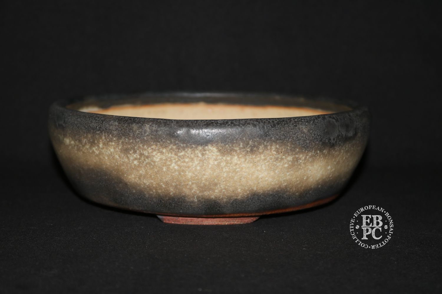 Ian Baillie - 20.3cm; Round; Traditional Design; Superb Glaze; Antique Burnt Cream; Scroll Feet; Basal Band.        Made by Ian Baillie of Scotland.