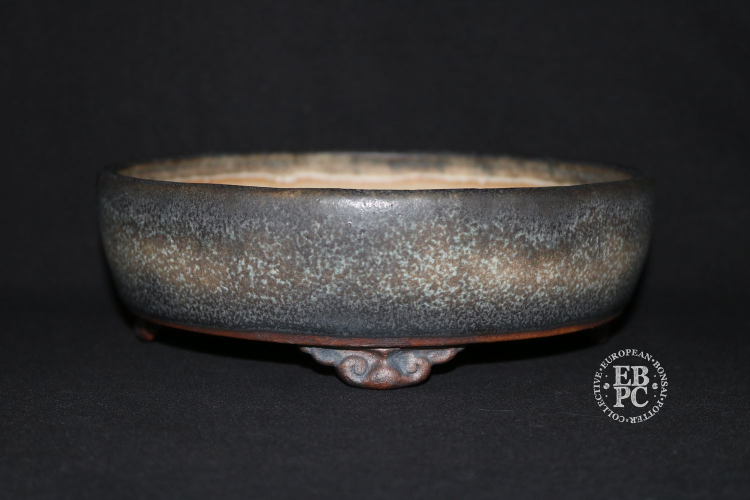 Ian Baillie - 19.3cm; Round; Traditional Design; Superb Glaze; Antique Burnt Cream; Scroll Feet;        Made by Ian Baillie of Scotland.