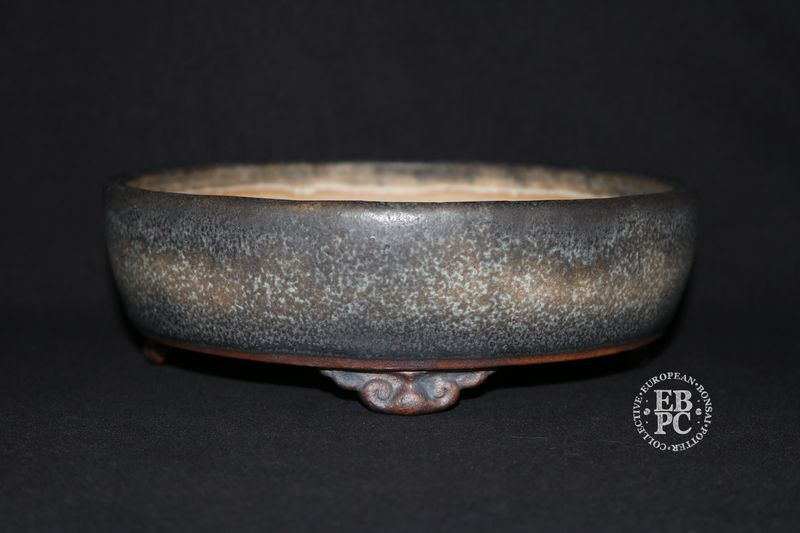 Ian Baillie - 19.3cm; Round; Traditional Design; Superb Glaze; Antique Burnt Cream; Scroll Feet;        Made by Ian Baillie of Scotland.