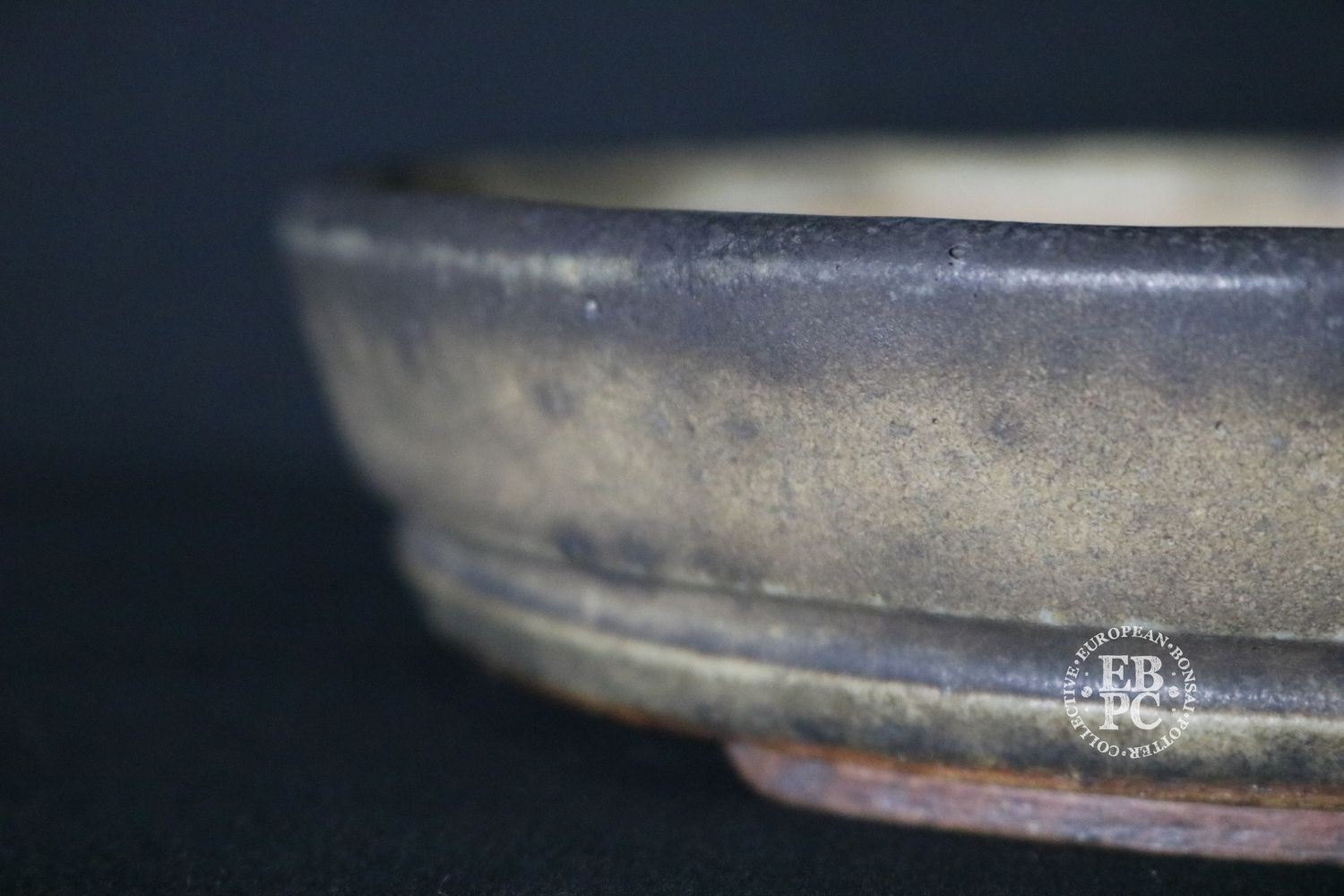 Ian Baillie - 18.9cm; Round; Traditional Design; Superb Glaze; Antique Burnt Cream; Recessed Feet; Incised Basal Band.        Made by Ian Baillie of Scotland.