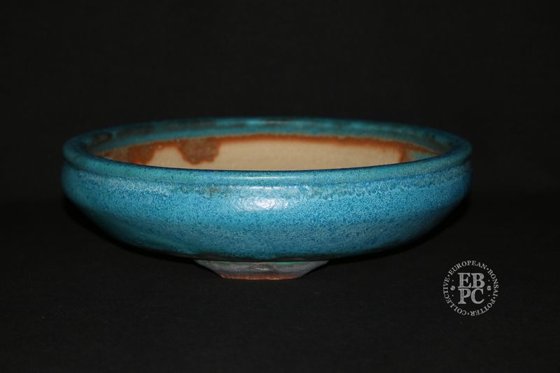 Ian Baillie - 26.7cm; Round; Bag Style Design; Intricate Glaze; Blues; Stepped Feet.      Made by Ian Baillie of Scotland.
