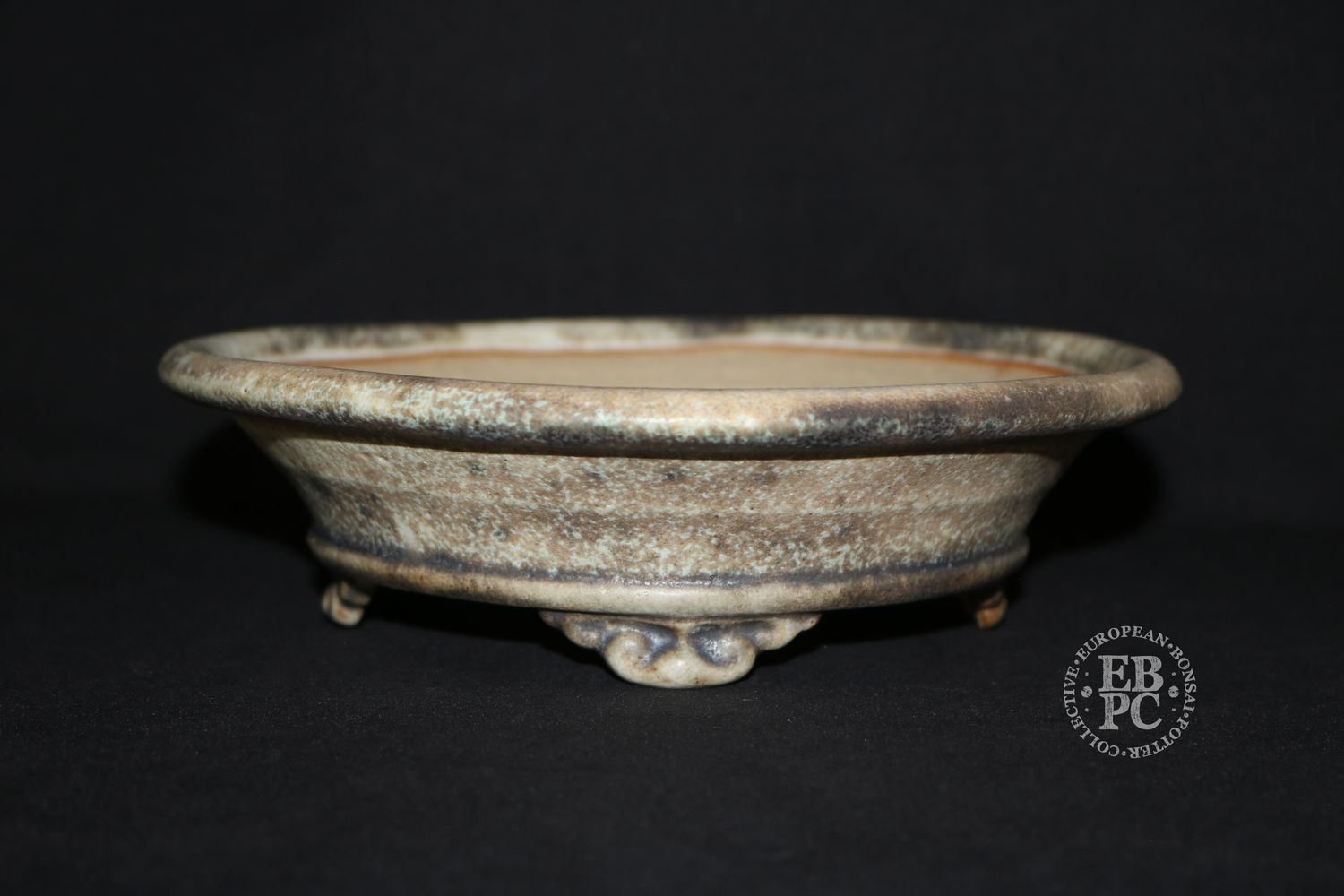 Ian Baillie - 21.6cm; Round; Flared Design; Thick Rim; Superb Glaze; Cream; Browns; Scroll Feet; Basal Band.      Made by Ian Baillie of Scotland.