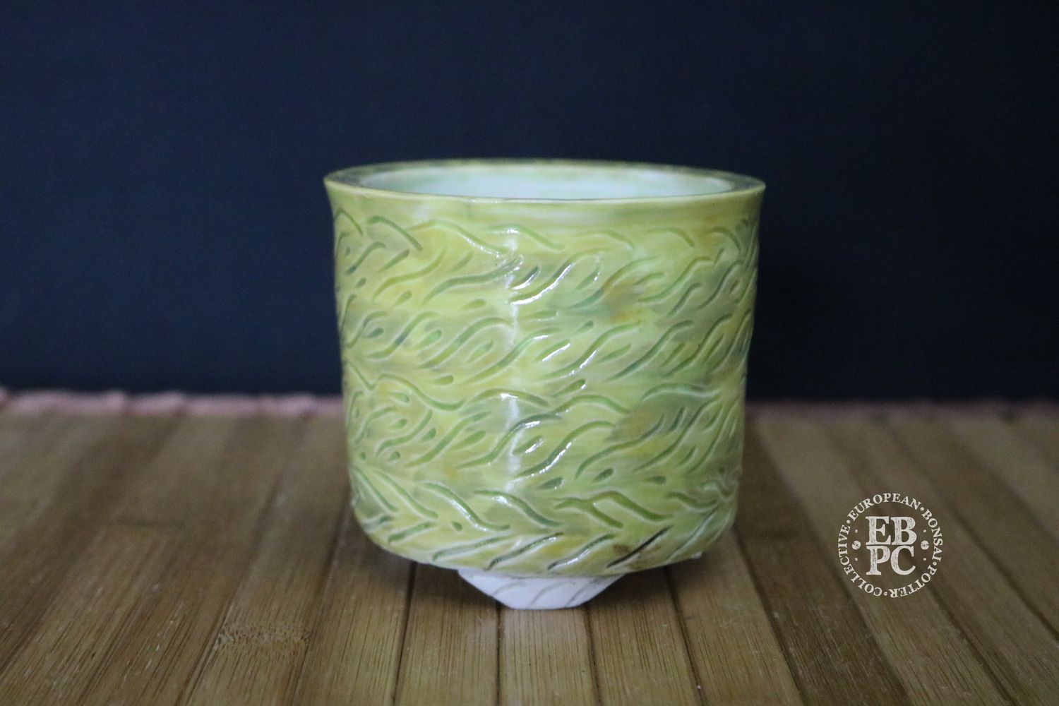 EBL Pots - 8.7cm; Handmade; Round; carved Pattern; Glazed; Light Yellow/Green; Unglazed Feet; EBPC Stamped; Elsebeth Bruun Ludvigsen