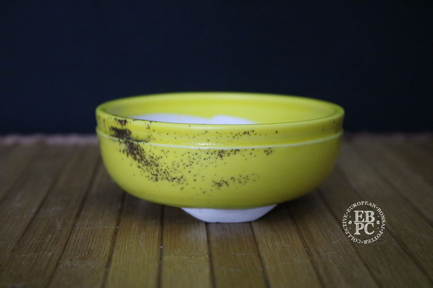 EBL Pots - 10.1cm; Handmade; Porcelain; Refined Round; Vibrant Glaze; Yellow, Volcanic Lava Sand; Unglazed Feet; EBPC Stamped; Elsebeth Bruun Ludvigsen