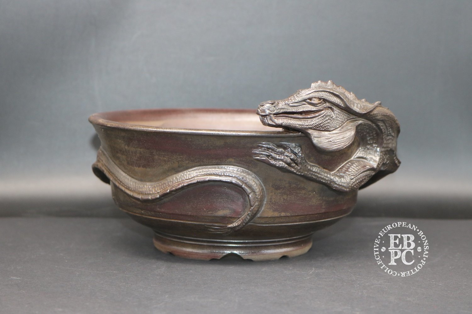 Makisada Ceramics - 20.5cm; Unique; Makisada Dragon pot; Glazed; Round; Semi cascade; Aubergine / brown