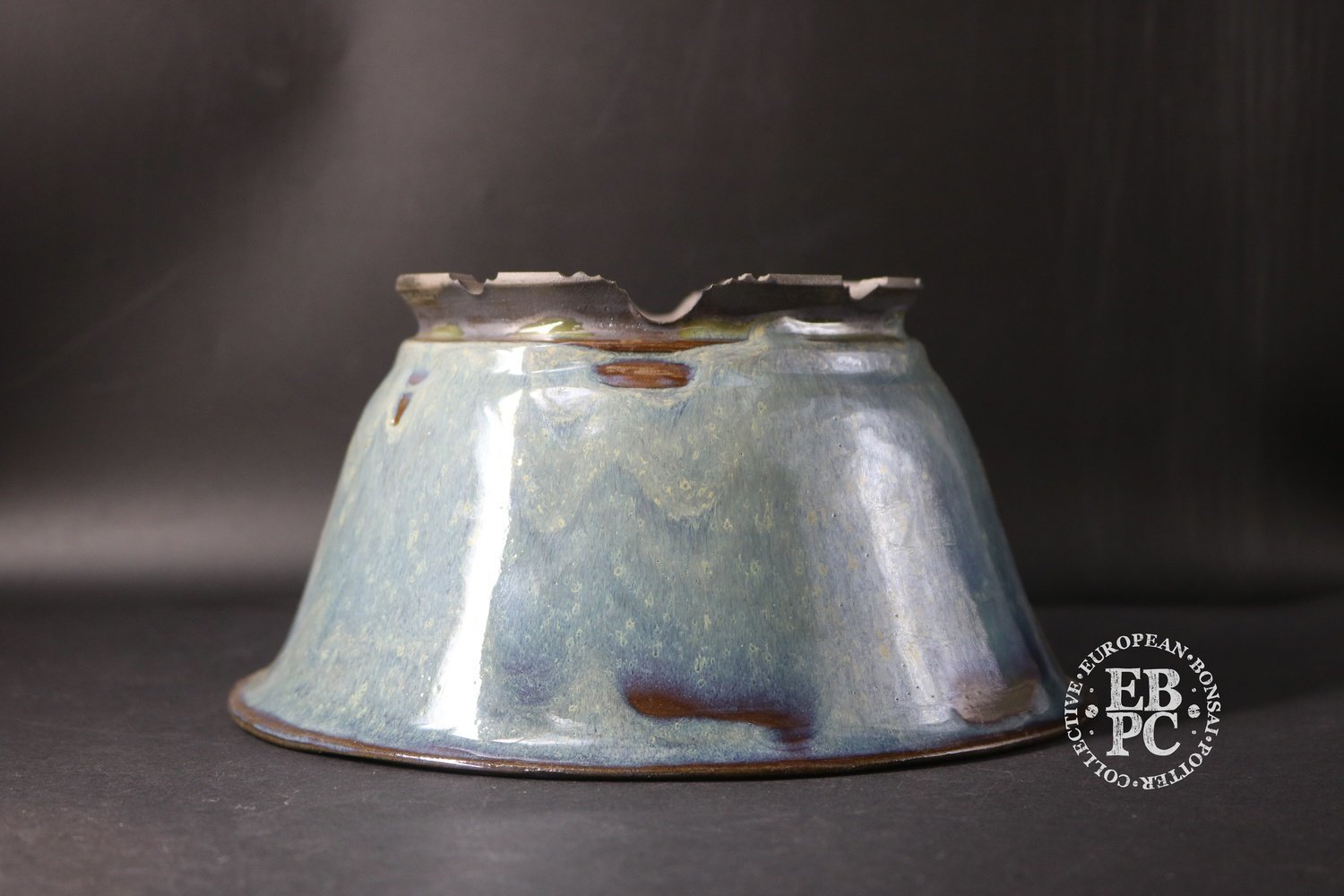 Makisada Ceramics - 20.8cm; Captivating glaze; Round; Semi cascade; Blue &amp; white over brown