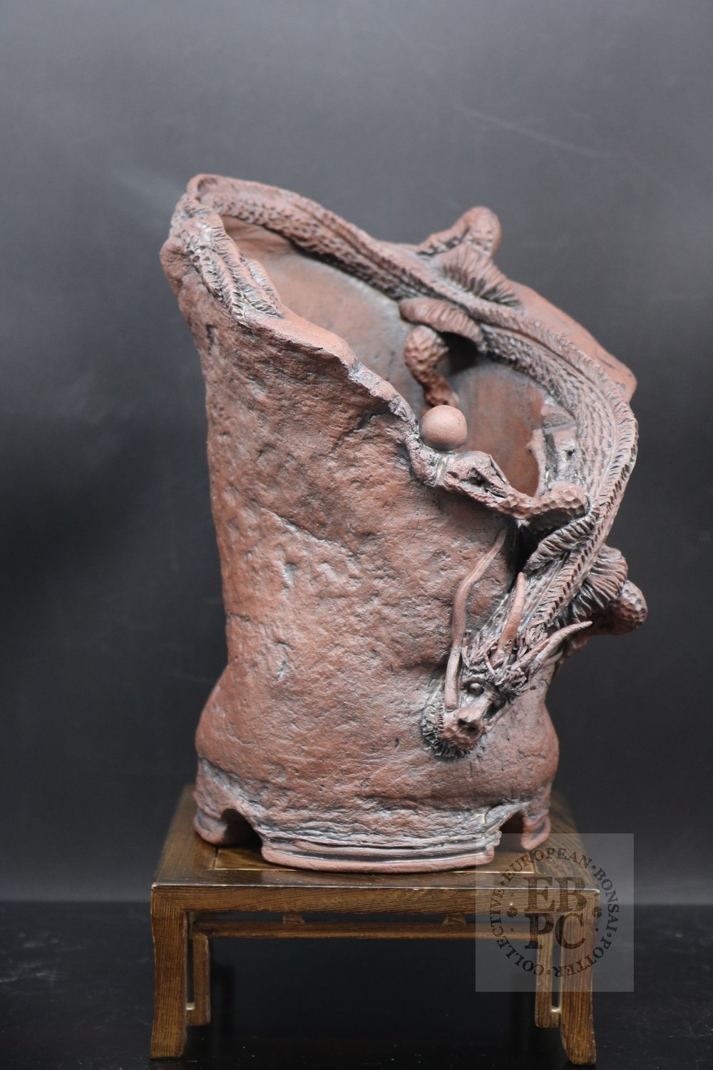 M.B. Berenbrinker - 20.2cm; European; kifu; cascade; unglazed; brown; dragon; carved; sculpted