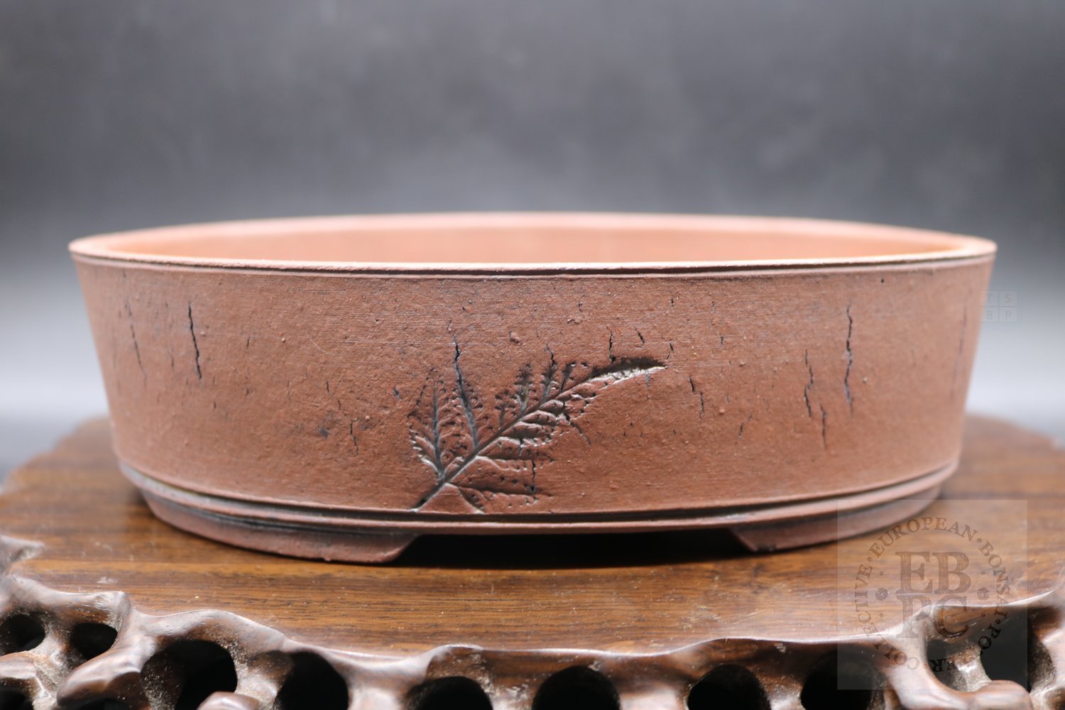 M.B. Berenbrinker - 23cm; European; kifu; oval; unglazed; brown; craved / imprint leaf
