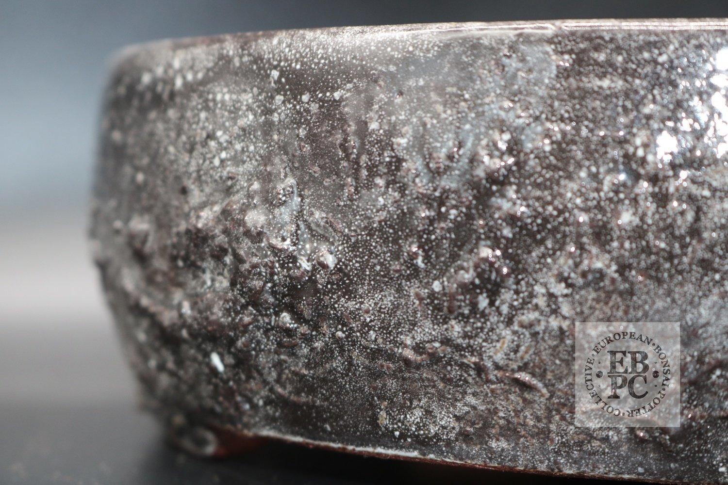 SOLD - M.B. Berenbrinker - 24.5cm; European; kifu; oval; glazed; grey; brown; textured