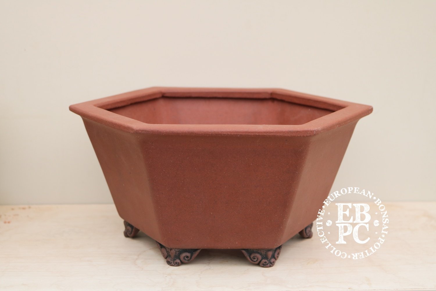 SOLD - Stone Monkey Ceramics - 23cm; unglazed; hexagonal; semi cascade; cloud feet