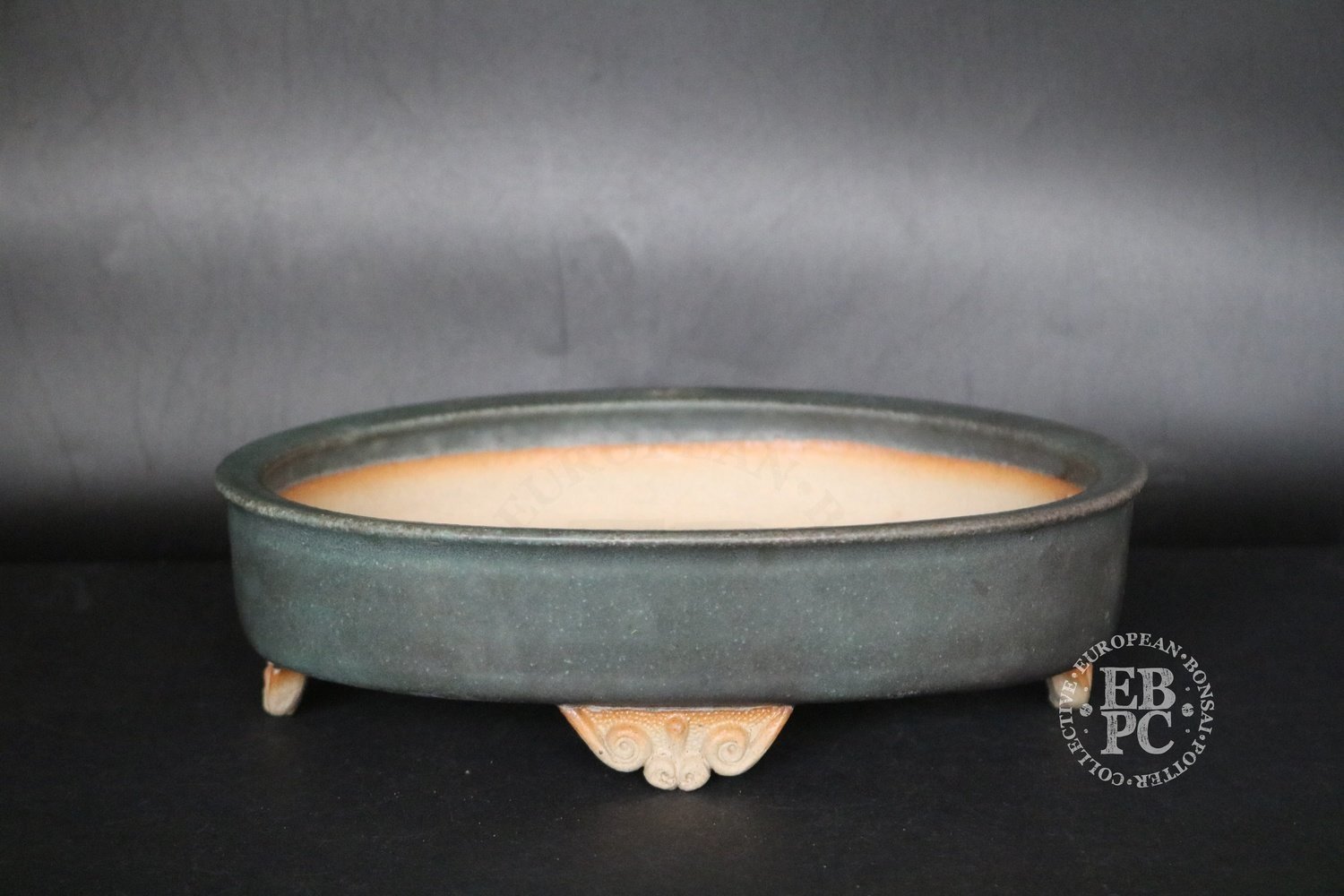 SOLD - Stone Monkey Ceramics - 21cm; Glazed; Oval; Dark green; Cloud feet; Andrew Pearson