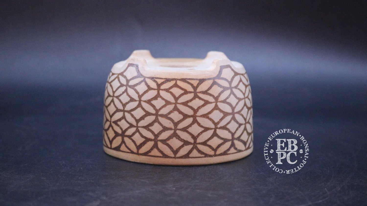 Sansai Bonsai Pots - 9cm; Carved; Unglazed; Round; Unique Brown clay in White clay design; Infill technique; Pattern; Tom Benda