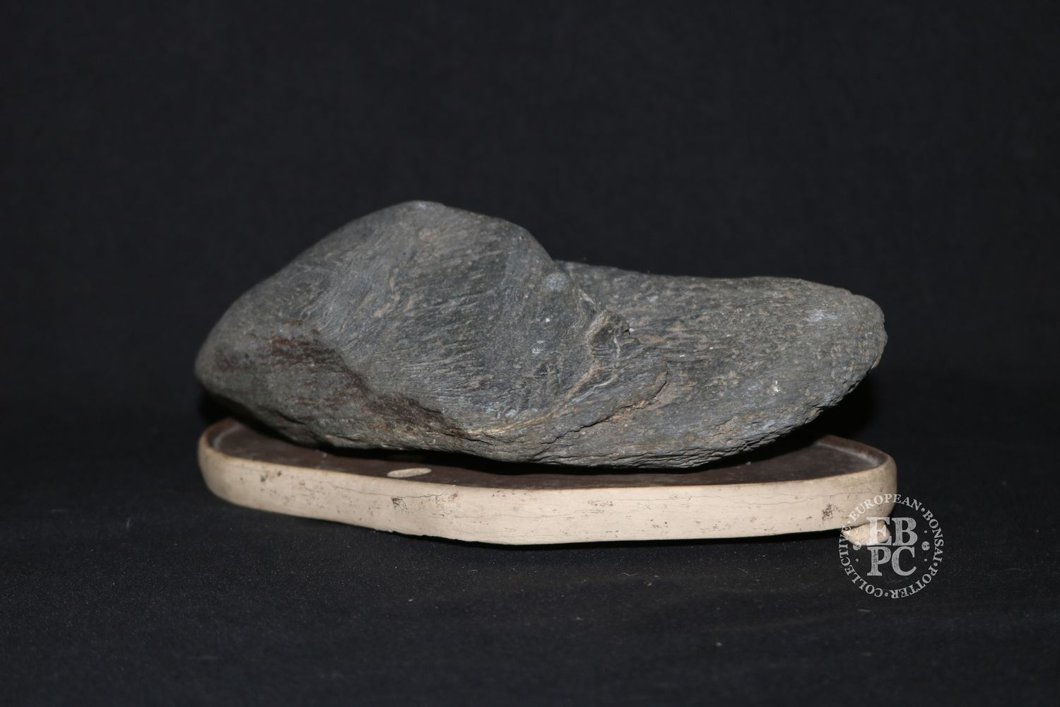 Suiseki; 19.cm; Viewing Stone; Platform Stone; Kuro-ishi; D. Grey; Ceramic Daiza Base Made By Derek Aspinall, England, Derek Aspinall's Private Collection. Daiza Damage - Selling for Derek's family.