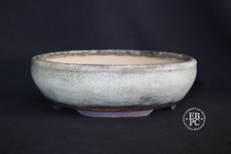 Ian Baillie - 25.6cm; Round; Elegant Design; Superb Glaze; White; Browns; Charcoal; Recessed Feet;                                 Made by Ian Baillie of Scotland.
