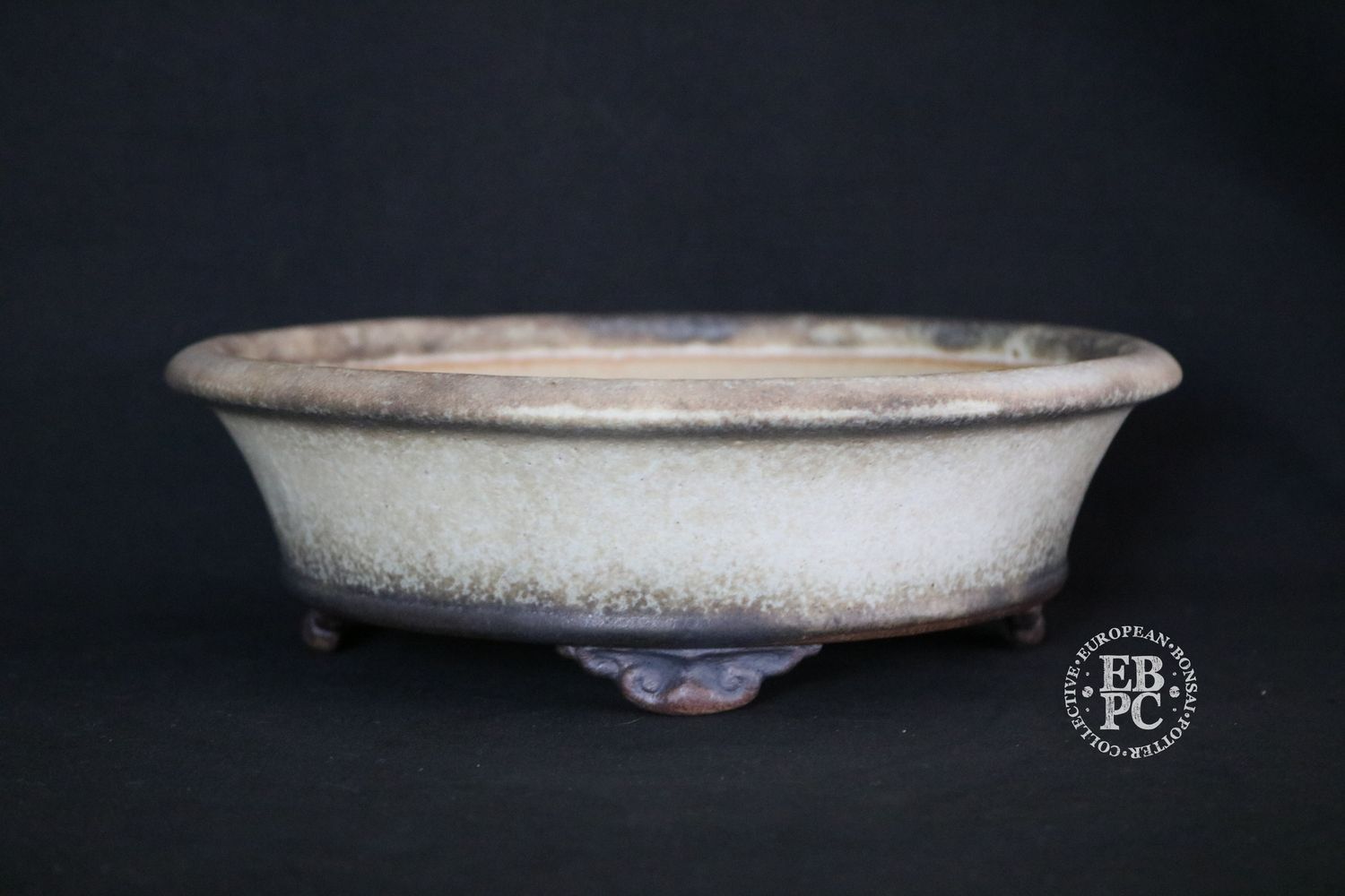 Ian Baillie - 22.1cm; Round; Flared Design; Thick Rim; Superb Glaze; Cream; Browns; Scroll Feet; Basal Band.                       Made by Ian Baillie of Scotland.