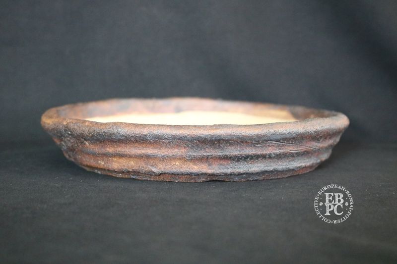 Ian Baillie - 22.2cm; Unglazed; Nanban; Oatmeal Clay; Rustic; Aged looking; Browns; Red Tones; Charcoal Grey; Hand-signed; EBPC Stamped