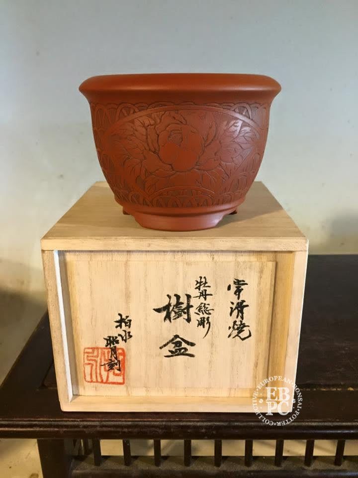 Motozo, Japan.  10.6cm; Round; Unglazed; Shudei Clay; Hand-Carved; Detailed Work; Signed By the Artist; Signed / Stamped Box &amp; Cloth.