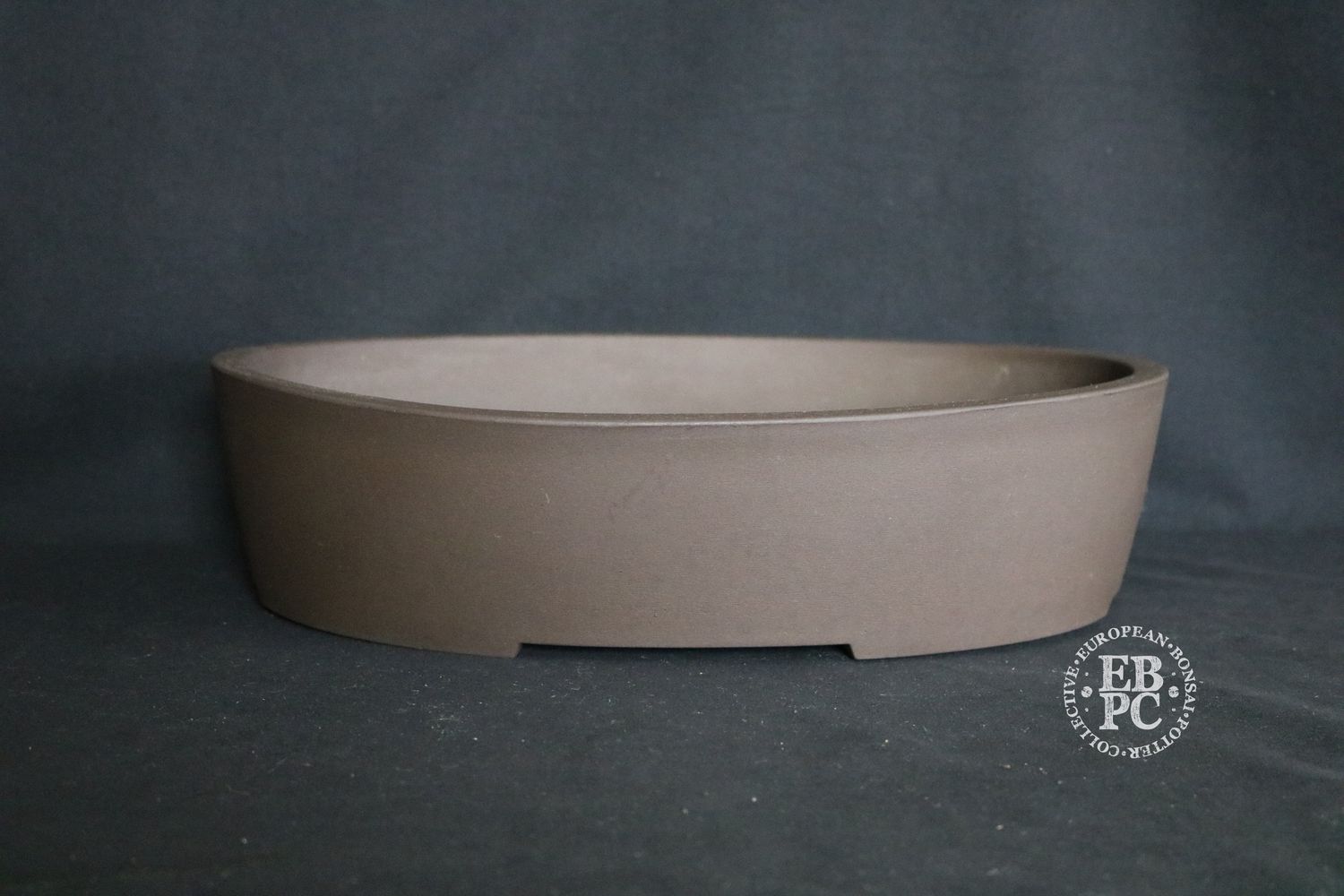 Sankyou, Tokoname, Japan.       36.5cm; Large Oval; Classic Design; Unglazed; Stamped.