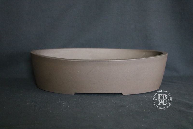 Sankyou, Tokoname, Japan.       36.5cm; Large Oval; Classic Design; Unglazed; Stamped.