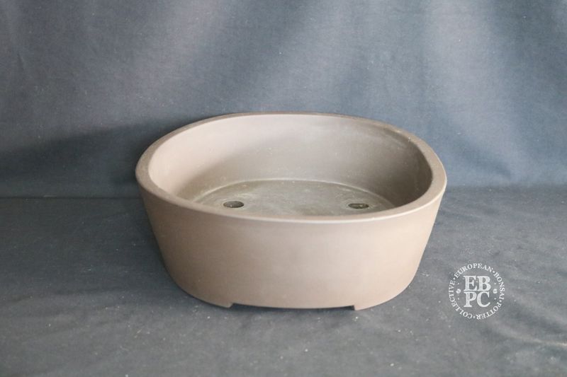 Sankyou, Tokoname, Japan.       36.5cm; Large Oval; Classic Design; Unglazed; Stamped.