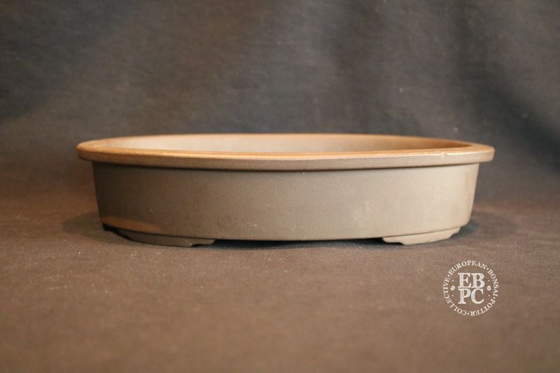 Sankyou, Tokoname, Japan.     25cm; Unglazed; Oval; Stamped.
