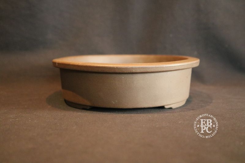 Sankyou, Tokoname, Japan.     25cm; Unglazed; Oval; Stamped.