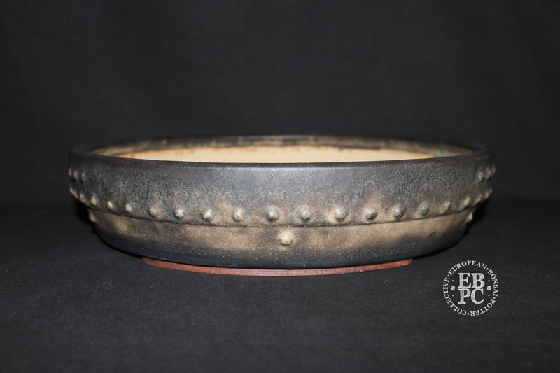 Ian Baillie - 36.5cm; Round; Drum Style; Superb Aged-looking Glaze;  Rivets/Studs; Recessed Feet; Browns;    Made by Ian Baillie of Scotland.