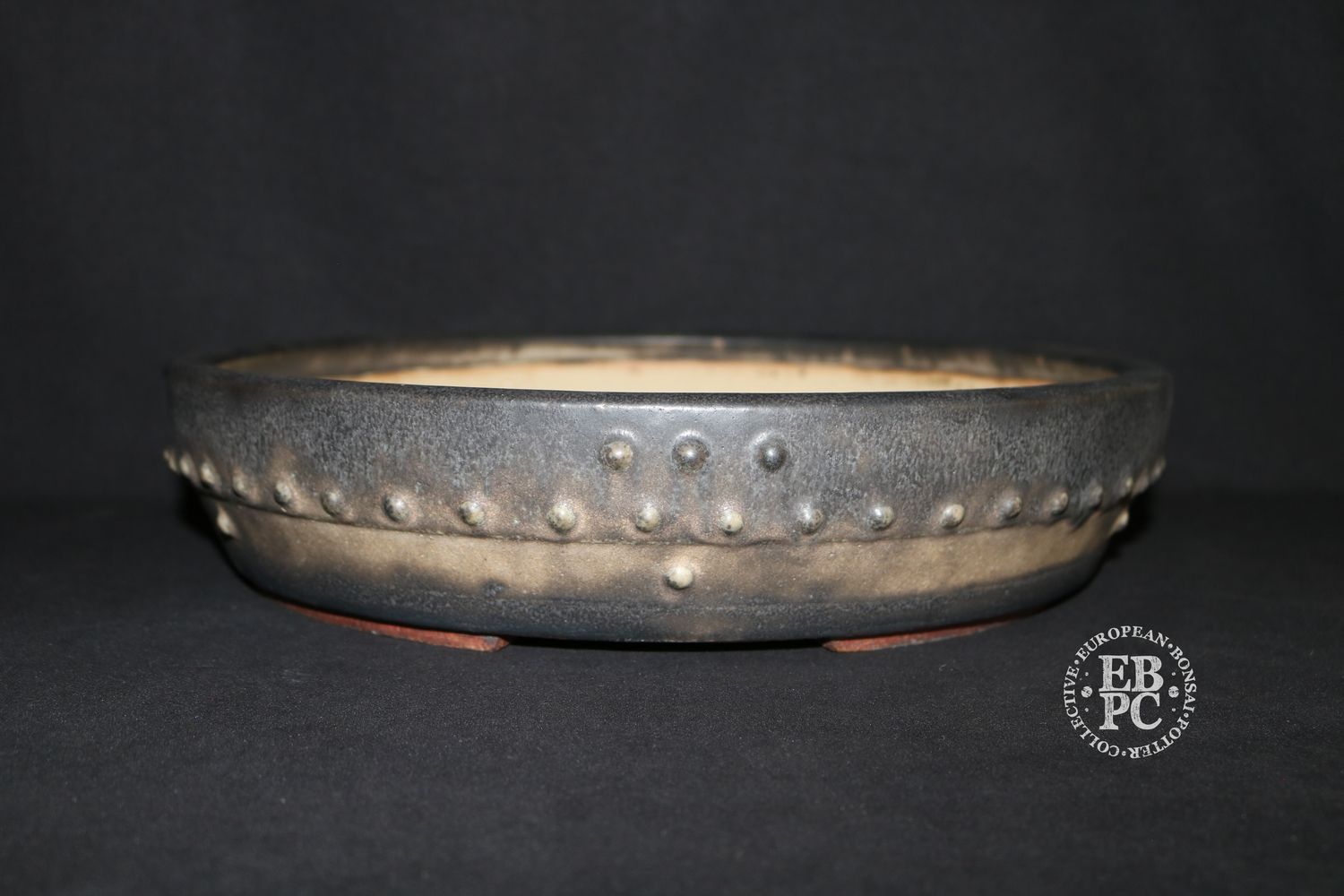 Ian Baillie - 36.5cm; Round; Drum Style; Superb Aged-looking Glaze;  Rivets/Studs; Recessed Feet; Browns;    Made by Ian Baillie of Scotland.