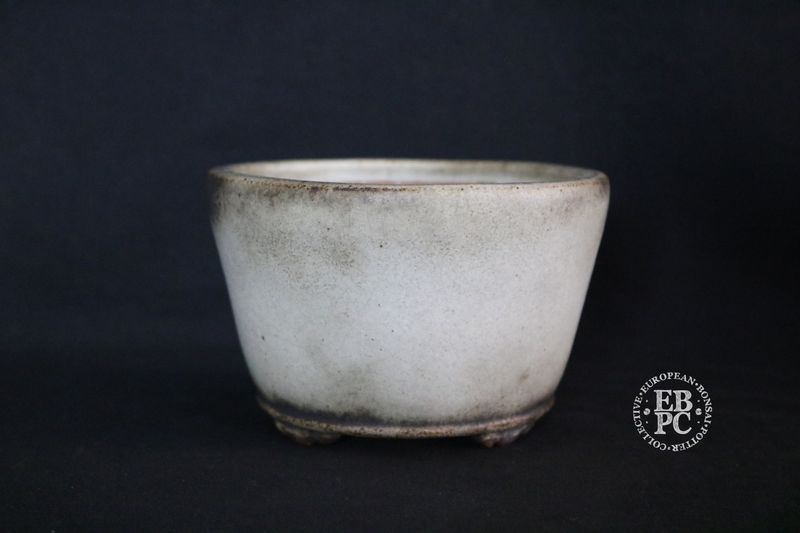 Ian Baillie - 13.3cm; Round; Delicate Design &amp; Build; Superb Glaze; Antique White; Scroll Feet; Basal Band.       Made by Ian Baillie of Scotland.