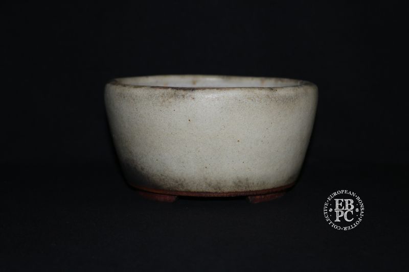 Ian Baillie - 16cm; Round; Semi Cascade; Superb Antique White Glaze; Charcoal Grey; Basal Band.       Made by Ian Baillie of Scotland.