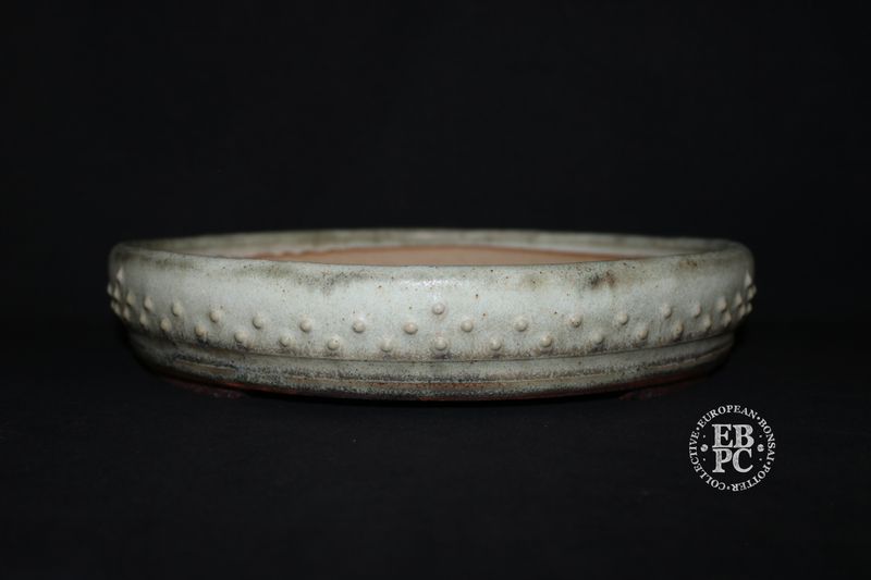 Ian Baillie - 32.1cm; Round; Drum Style; Superb Aged-looking Glaze; Rivets/Studs; Ivory/Bone; Light Mint Green; Browns; Made by Ian Baillie of Scotland. Ian Baillie - 32.1cm; Round; Drum Style; Superb Aged-looking Glaze; Rivets/Studs; Ivory/Bone; Light Mint Green; Browns; Made by Ian Baillie of Scotland.