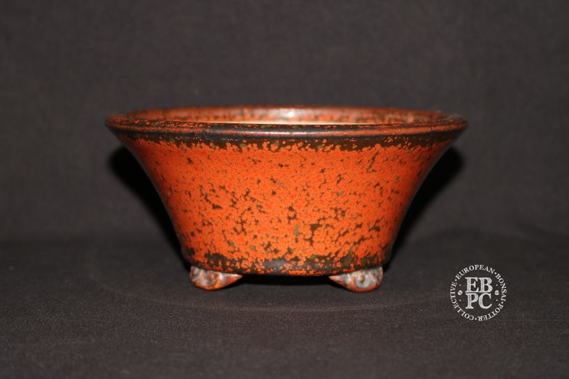 Ian Baillie - 15.5cm; Round; Red Crystalline Glaze; Gunmetal Grey; Delicate Carved Feet; Hand-signed; EBPC Stamped. Made by Ian Baillie of Scotland.
