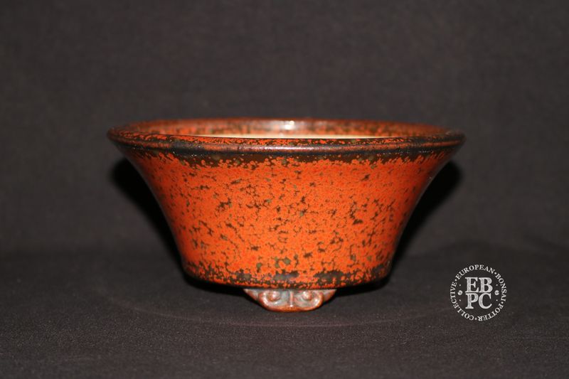 Ian Baillie - 15.5cm; Round; Red Crystalline Glaze; Gunmetal Grey; Delicate Carved Feet; Hand-signed; EBPC Stamped. Made by Ian Baillie of Scotland. Ian Baillie - 15.5cm; Round; Red Crystalline Glaze; Gunmetal Grey; Delicate Carved Feet; Hand-signed; EBPC Stamped. Made by Ian Baillie of Scotland.