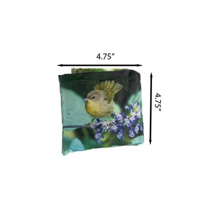 Common Yellowthroat reusable bag folded to 4.75 by 4.75 inches for compact storage – pocket-sized NYC wildlife design by Denn