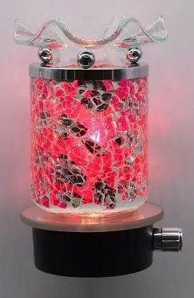Pink and silver crackle plug in oil burner Pink and silver crackle plug in oil burner