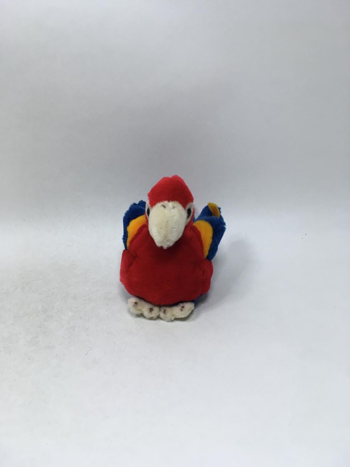 Steiff Papagei Lori 064616 mit Knopf und Fahne stehend 18 cm Sammlerstück