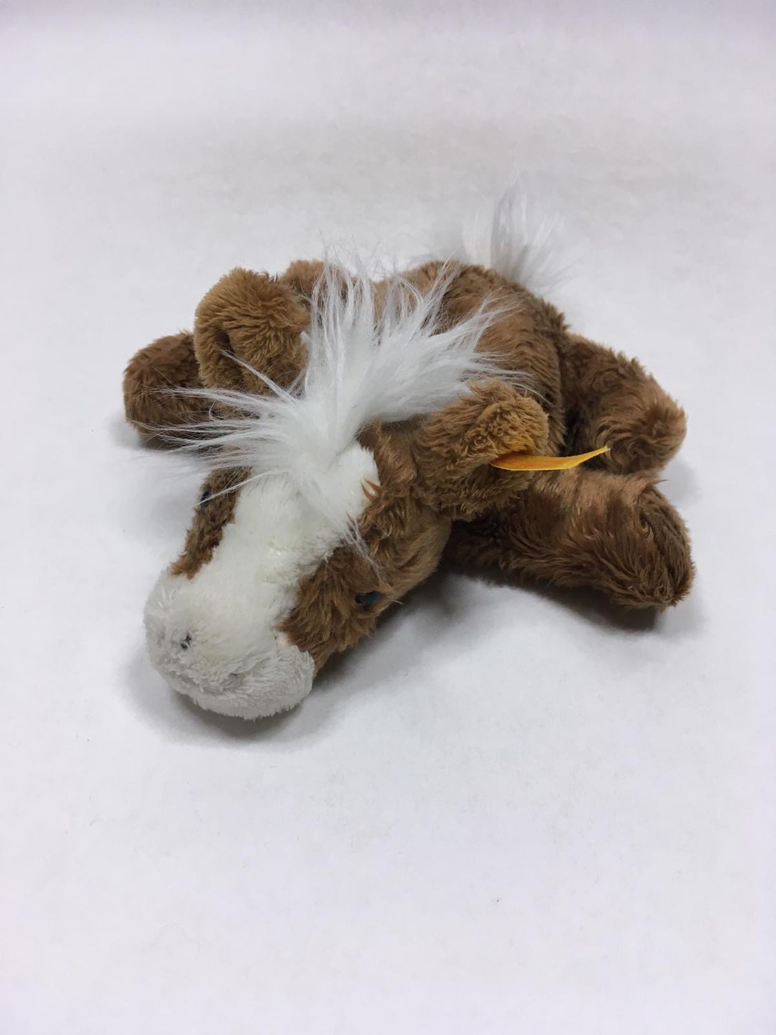 Steiff Pferd Pony Cosy Floppy 110610 mit Knopf und Fahne liegend 20 cm Sammlerstück