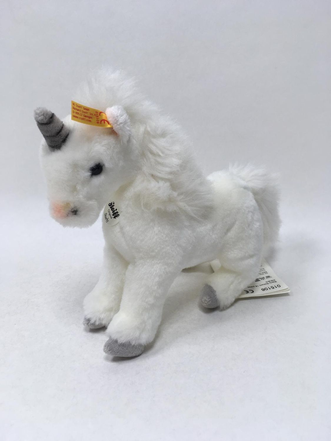 Steiff Einhorn Starly 015106 mit Knopf, Fahne und Brustschild stehend 25 cm Sammlerstück Neuwertig mit Etikett