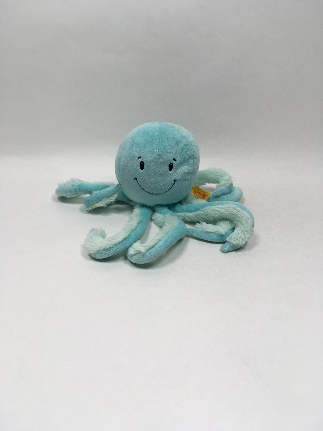 Steiff Octo Octopus 063770 mit Knopf und Fahne liegend 30 cm Sammlerstück