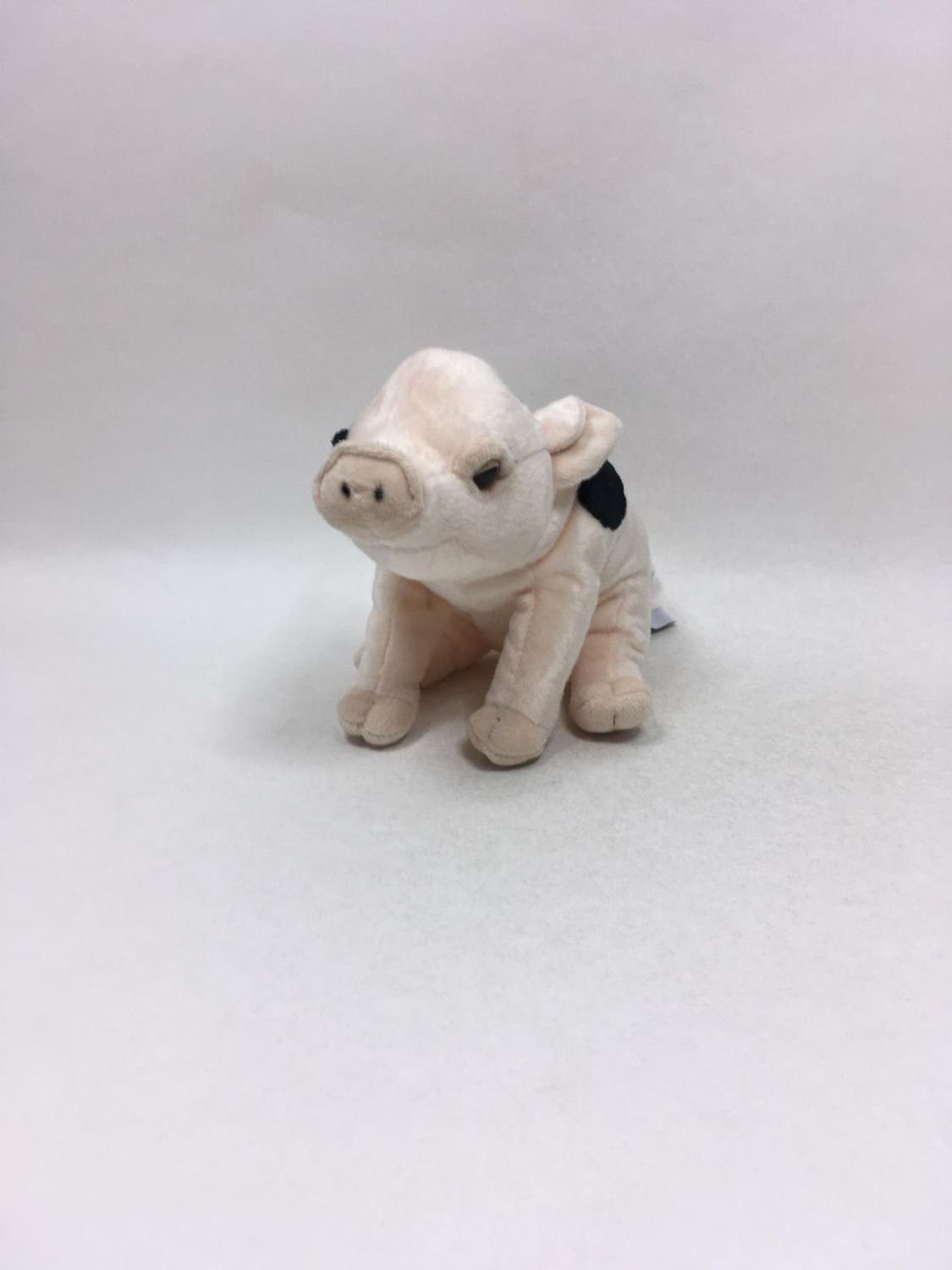 Schwein Uni-Toys sitzend 22 cm selten