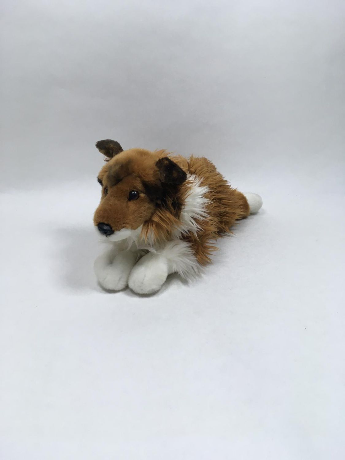 Hund Uni-Toys liegend 38 cm selten