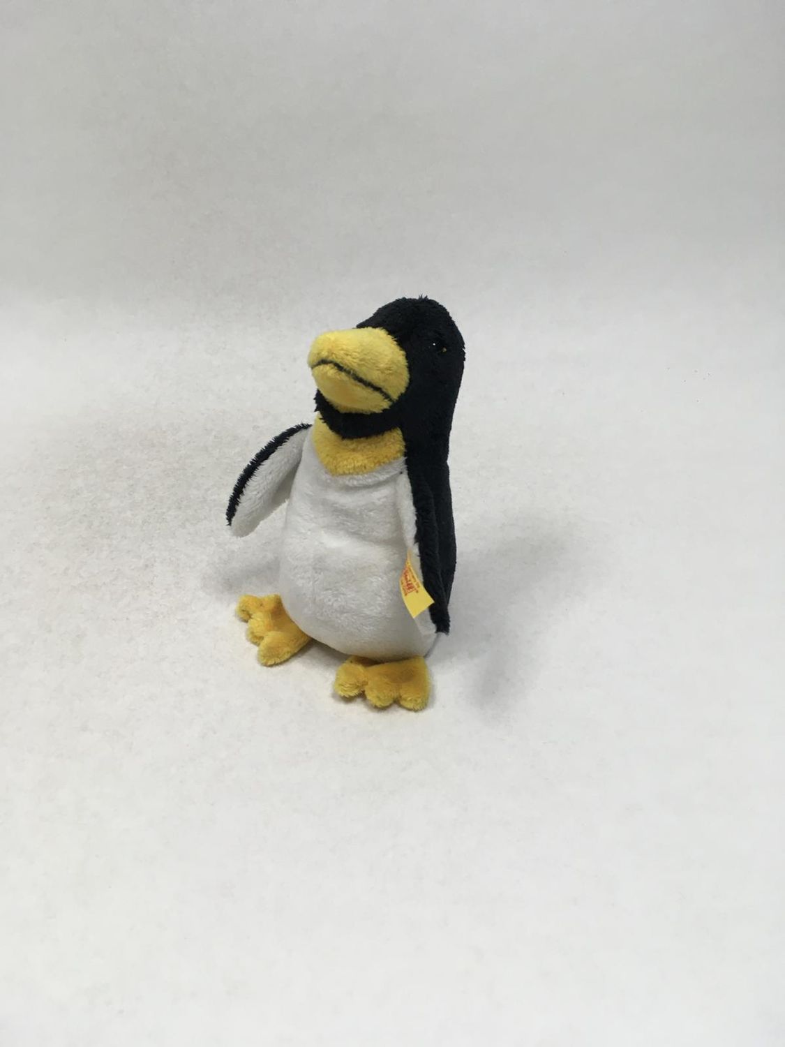 Steiff Pinguin 673375 mit Knopf und Fahne stehend 15 cm selten