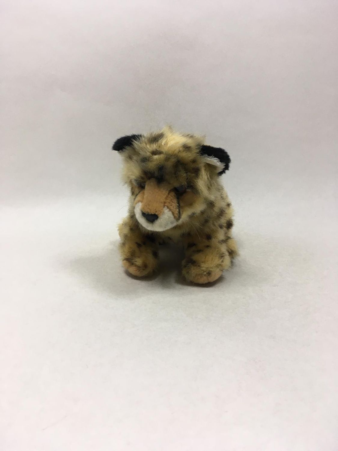Gepard Uni-Toys sitzend 27 cm selten