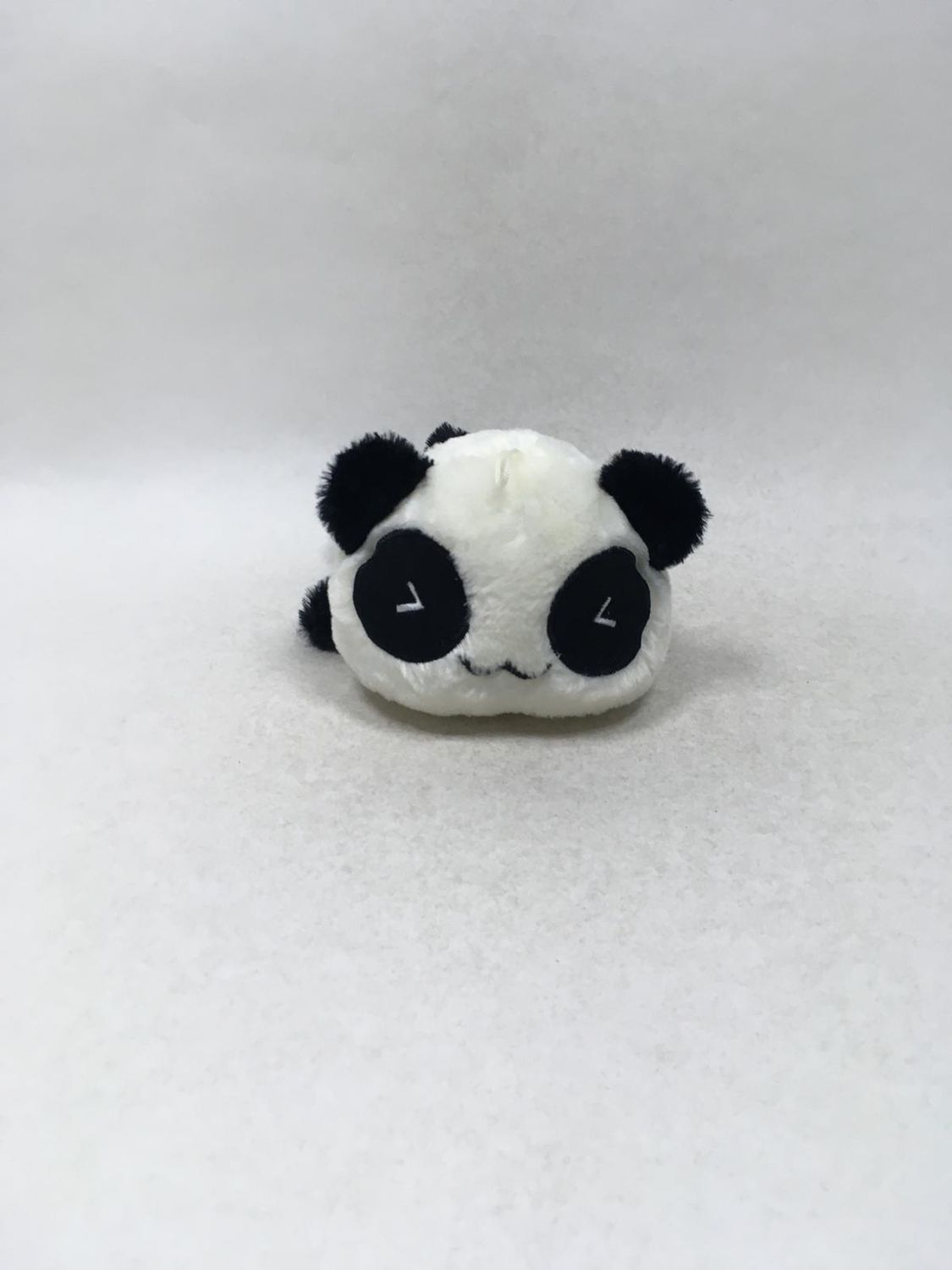 Panda Knuffel liegend 23 cm Sammlerstück